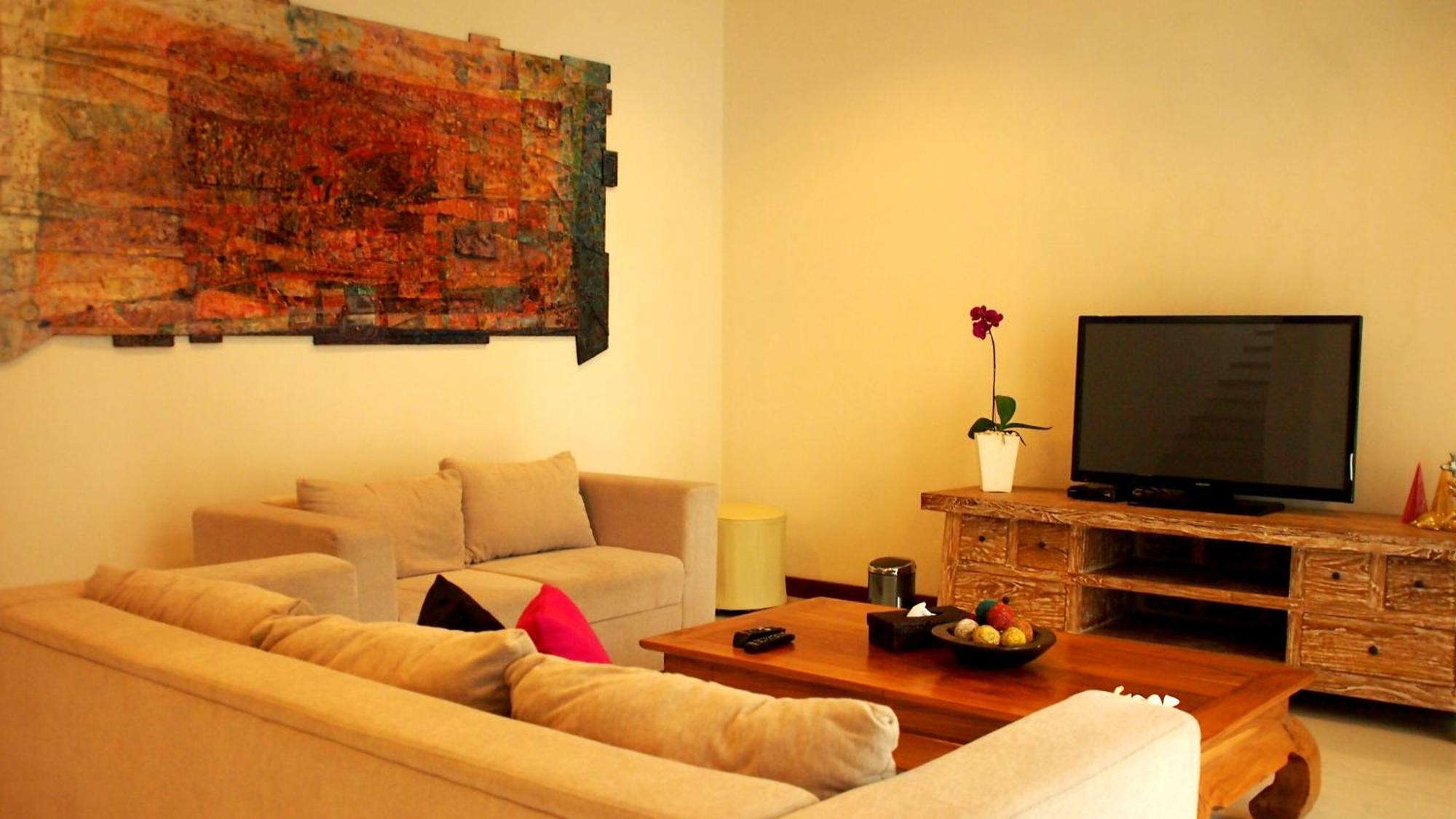 Pasific Beach Cottages Mangsit Pokoj fotografie