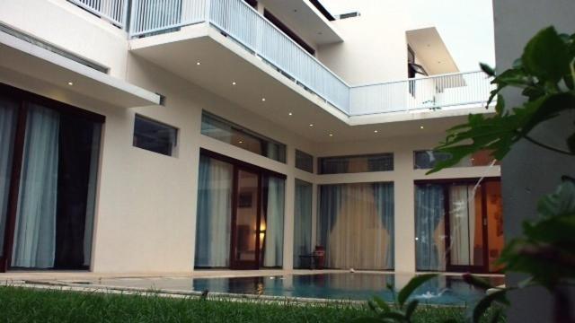 Pasific Beach Cottages Mangsit Pokoj fotografie